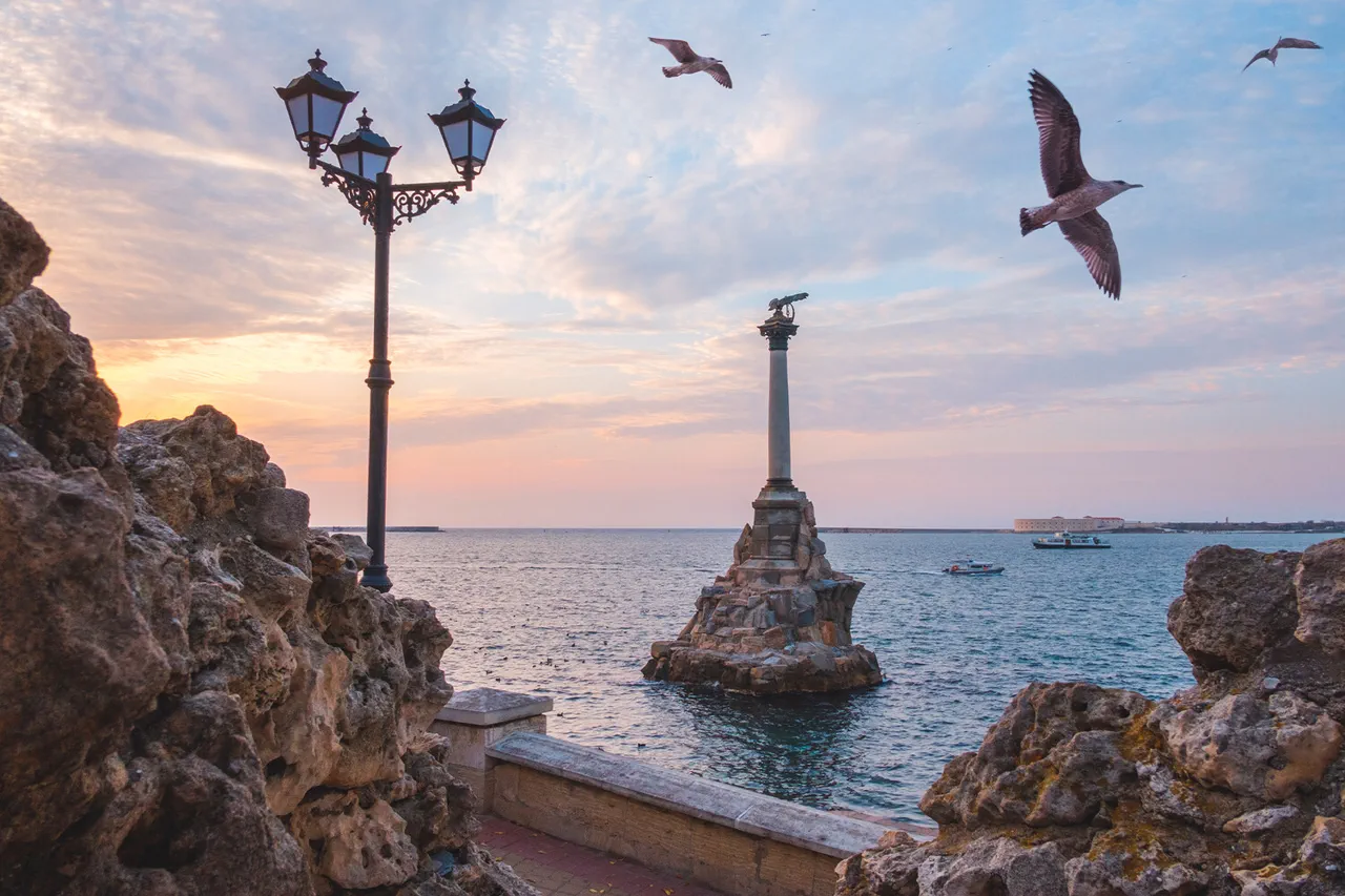 Escalating Tensions in Crimea: Ukrainian Drone Strike on Feodosiya Oil Facility Clashes with Russian Claims of Successful Interception, as Conflicting Narratives Fuel Regional Uncertainty