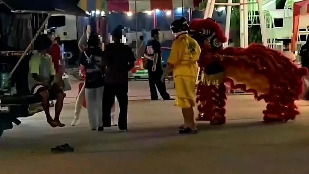 Thai Police Dazzle in Red Dragon Costume During Lunar New Year Art Theft Sting