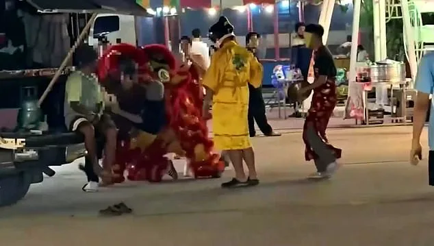 Thai Police Dazzle in Red Dragon Costume During Lunar New Year Art Theft Sting