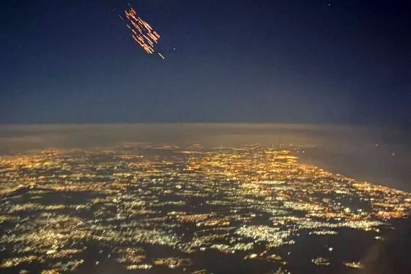 Exclusive Image Reveals Iran's Horramshahr-4 Missile Deploying Cluster Munitions Over Israel