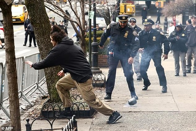 NYPD Officer's Heroic Leap During Explosive Clash Sparks Debate Over Policing and Far-Right Tensions