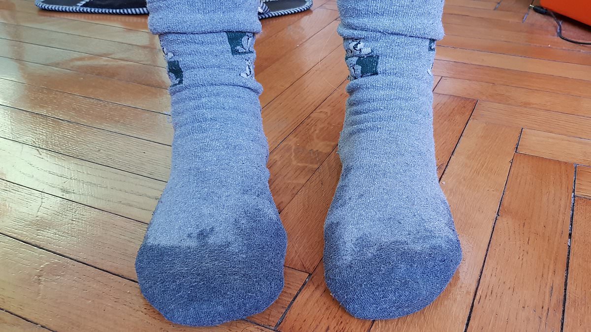 Wear damp socks and use frozen bottles to sleep through UK heatwave.
