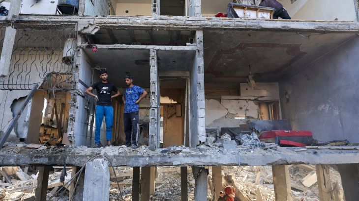 Israeli military intercepts Hezbollah aerial assault, causing damage in Kiryat Shmona.