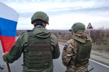 Russian Troops Raise Flag Over Administration Building in Occupied Guevo