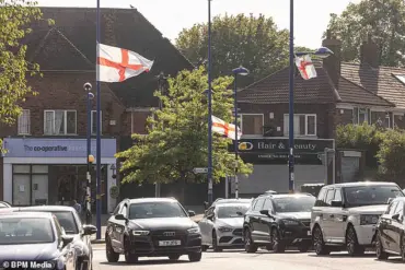 Birmingham Council Sparks Controversy Over Removal of St George’s and Union Jack Flags Amid Safety Concerns and Palestinian Flag Presence