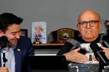 Rudy Giuliani Returns to 'America's Mayor Live' in Upper Body Brace After Car Crash, Jokes About 'Outfit' Despite Serious Injuries